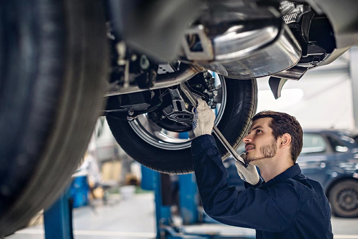 Mechanic working on car